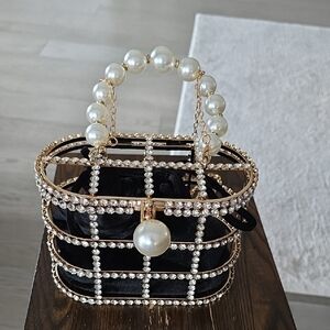 Elegant Black and Gold Pearl Handle Women's Bag